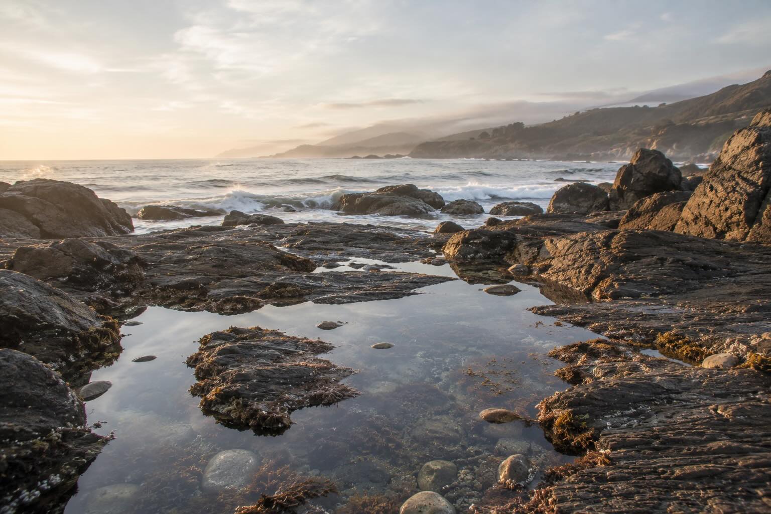 Weathered rocks and tide pools on a California coastline